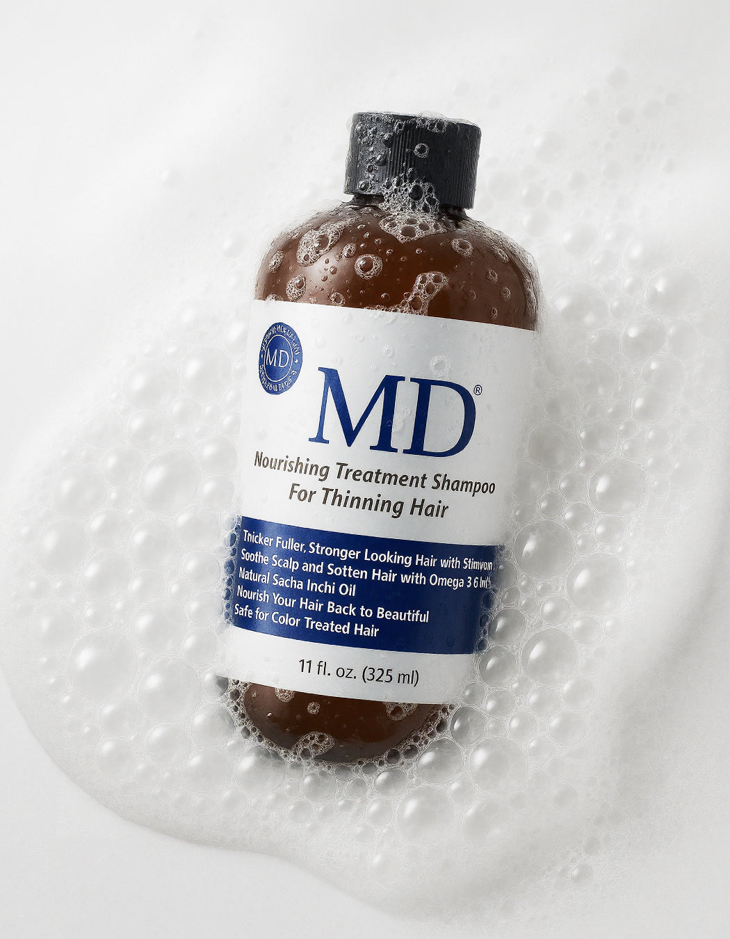 MD® Revitalizing Treatment Shampoo  for thinning hair and oily scalp, part of the MD Hair system