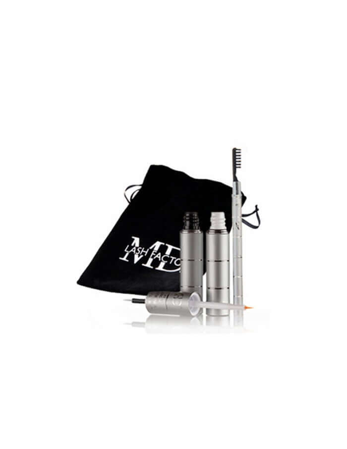 MD Lash & Brow Brush – dual-ended aluminum precision grooming tool shown with black velvet storage bag featuring MD logo